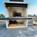 Ive By Belmont Realty *