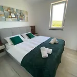 Ive By Belmont Realty *