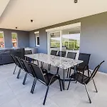 Ive By Belmont Realty *
