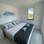 Ive By Belmont Realty *