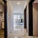 Ive By Belmont Realty *