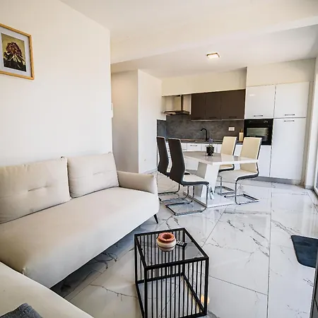 Ive By Belmont Realty *