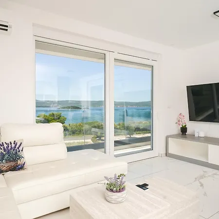 Ive By Belmont Realty *