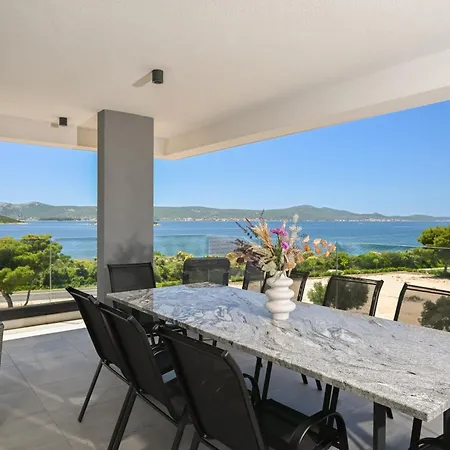 Ive By Belmont Realty *