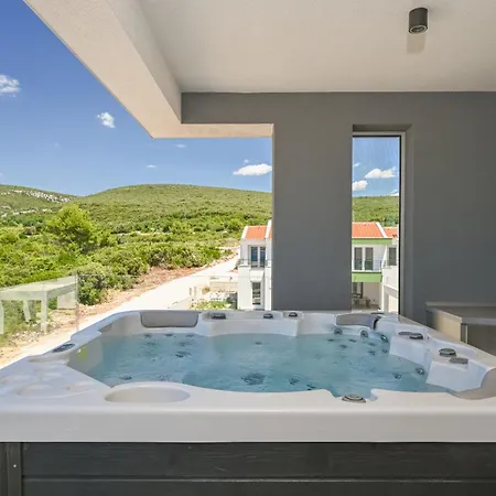 Ive By Belmont Realty *